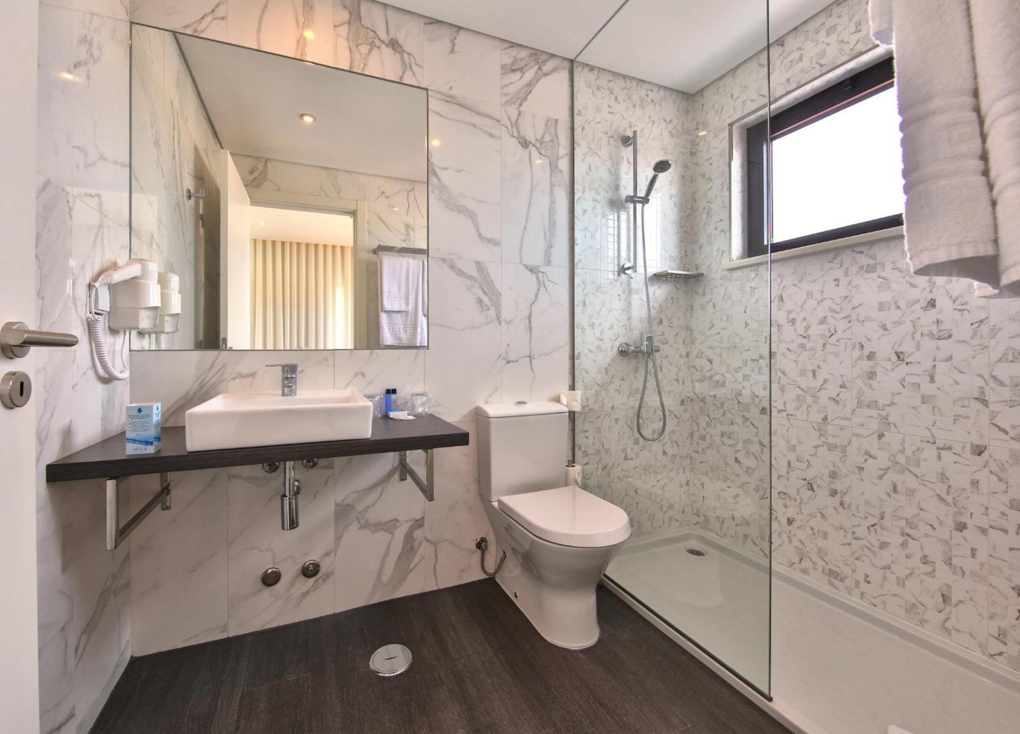 Agua Hotels Alvor Jardim Bagian luar foto